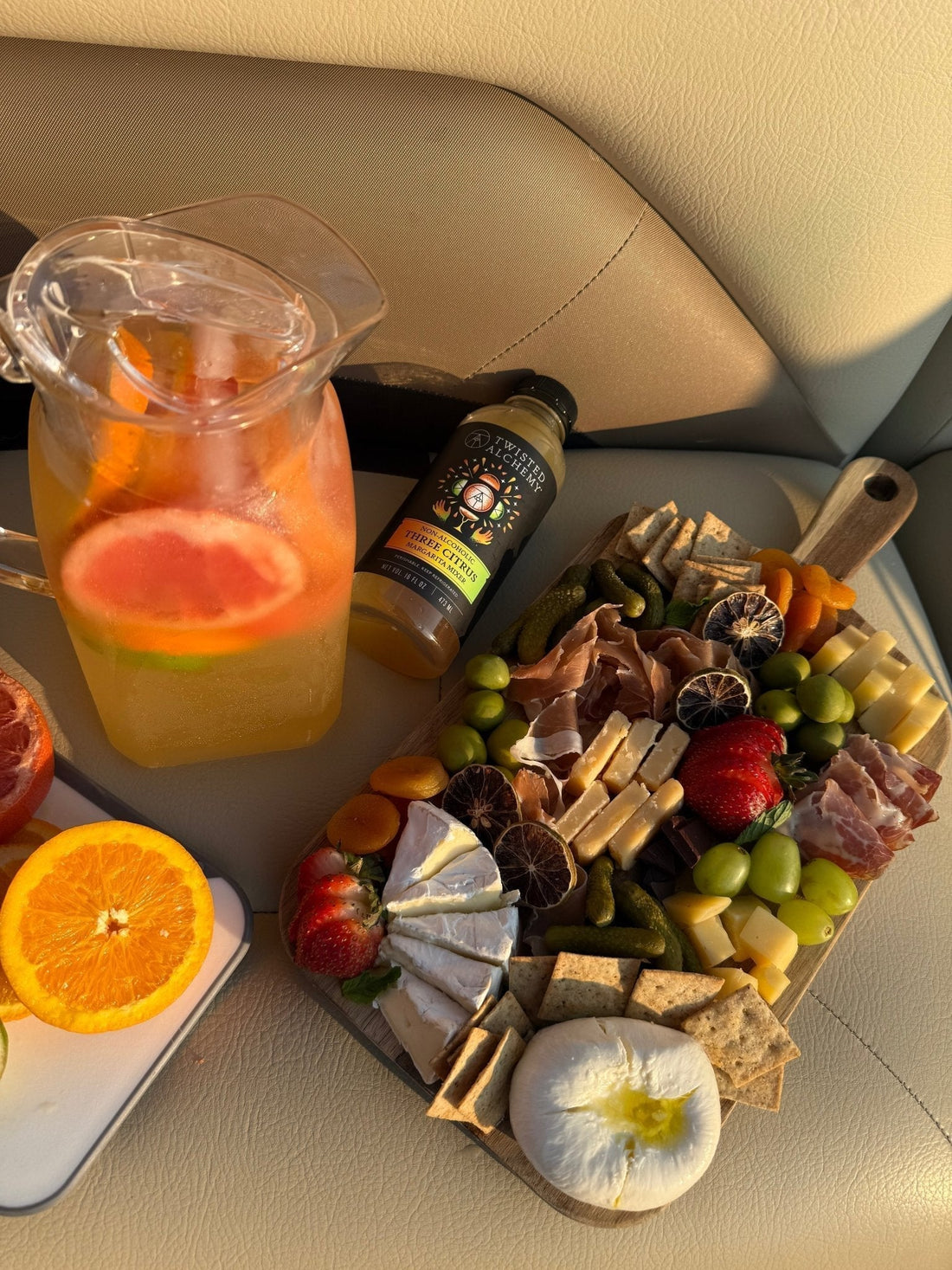 Boards, Batches, & Sunshine: Your Labor Day Hosting Hack is this Three Citrus Sangria Recipe - Twisted Alchemy