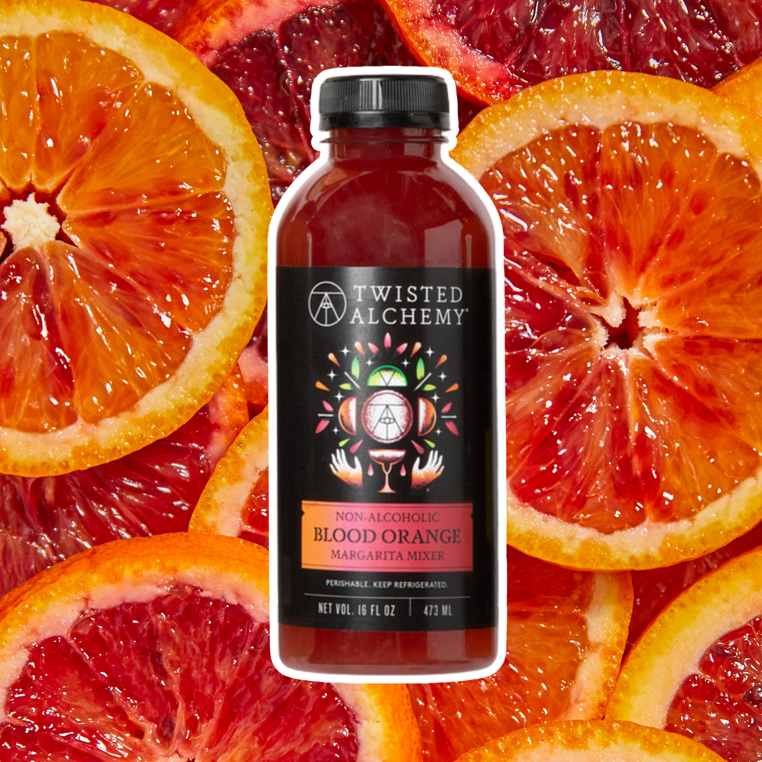 Bottle of Twisted Alchemy non-alcoholic blood orange margarita mix surrounded by sliced oranges